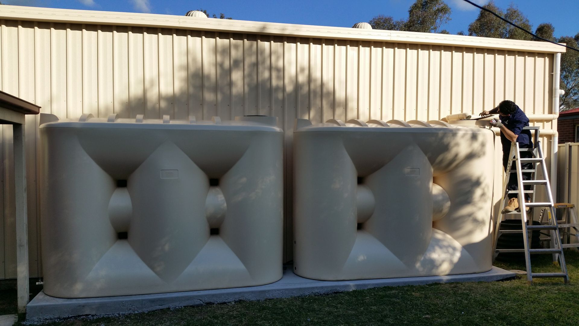 Slimline water tank installation in Bendigo